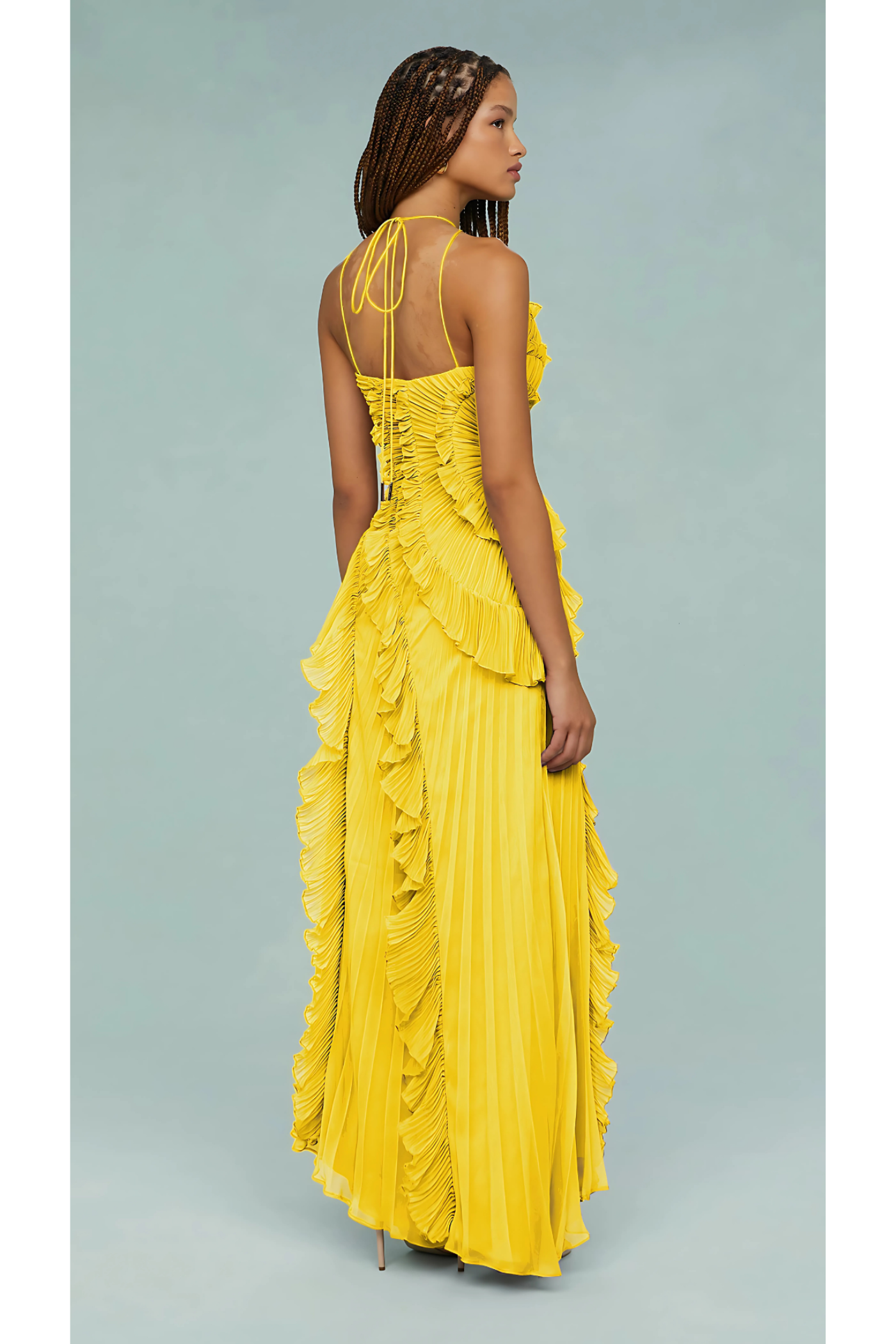 Yellow halter maxi dress with pleated ruffle details and open back