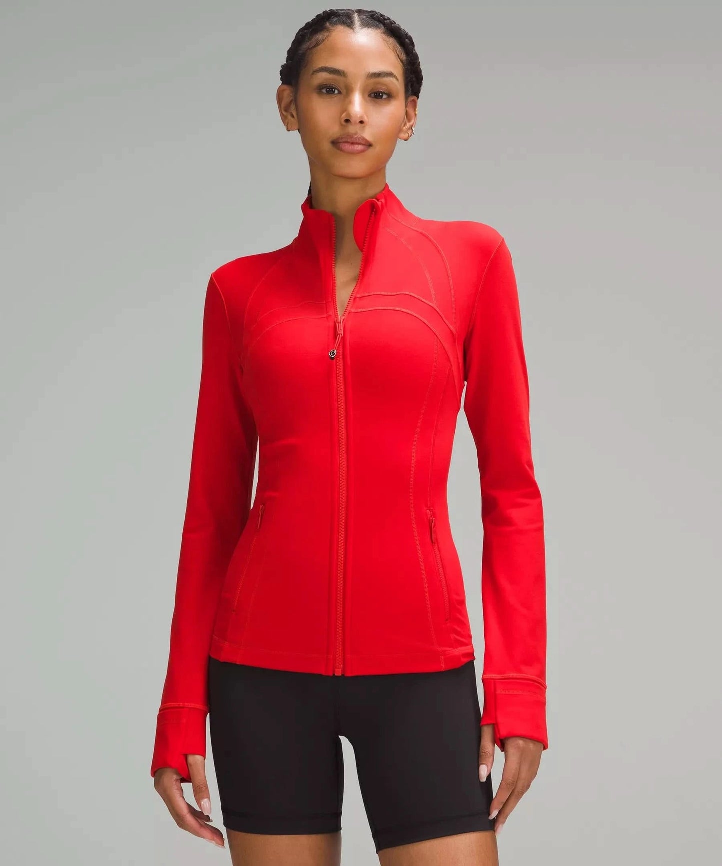 Red define jacket with curved seams and flared cuff sleeves