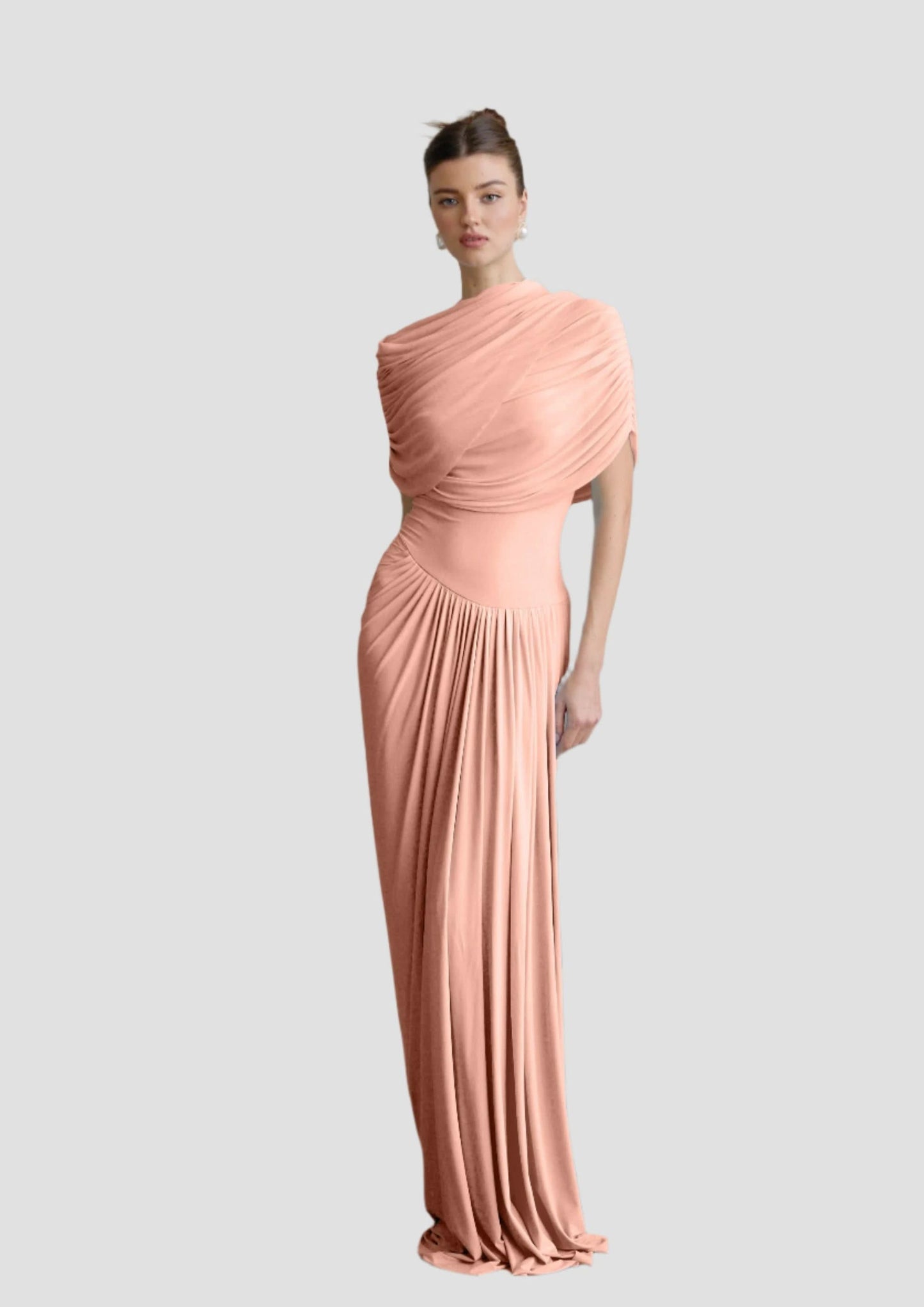 Peach wrap maxi dress with diagonal draped shoulder and pleated skirt