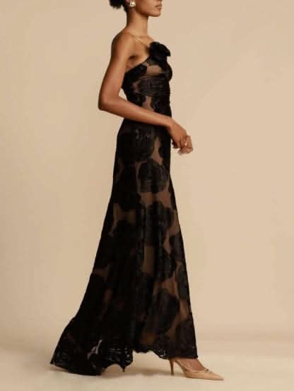 Side view of black 3D rose velvet maxi dress with floor-length hem for women