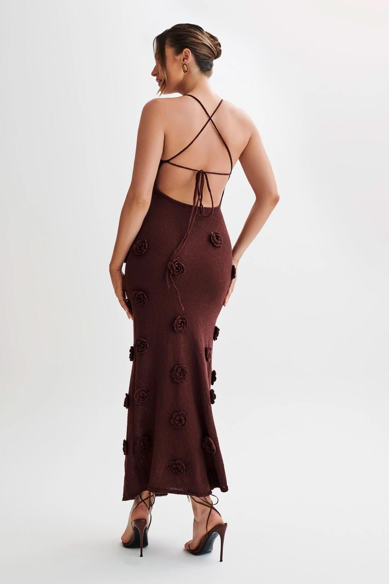 Burgundy maxi dress with 3D floral appliqués and open lace-up back