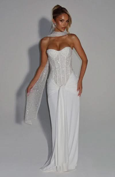 Ivory beaded strapless maxi dress with flowing pleated skirt detail