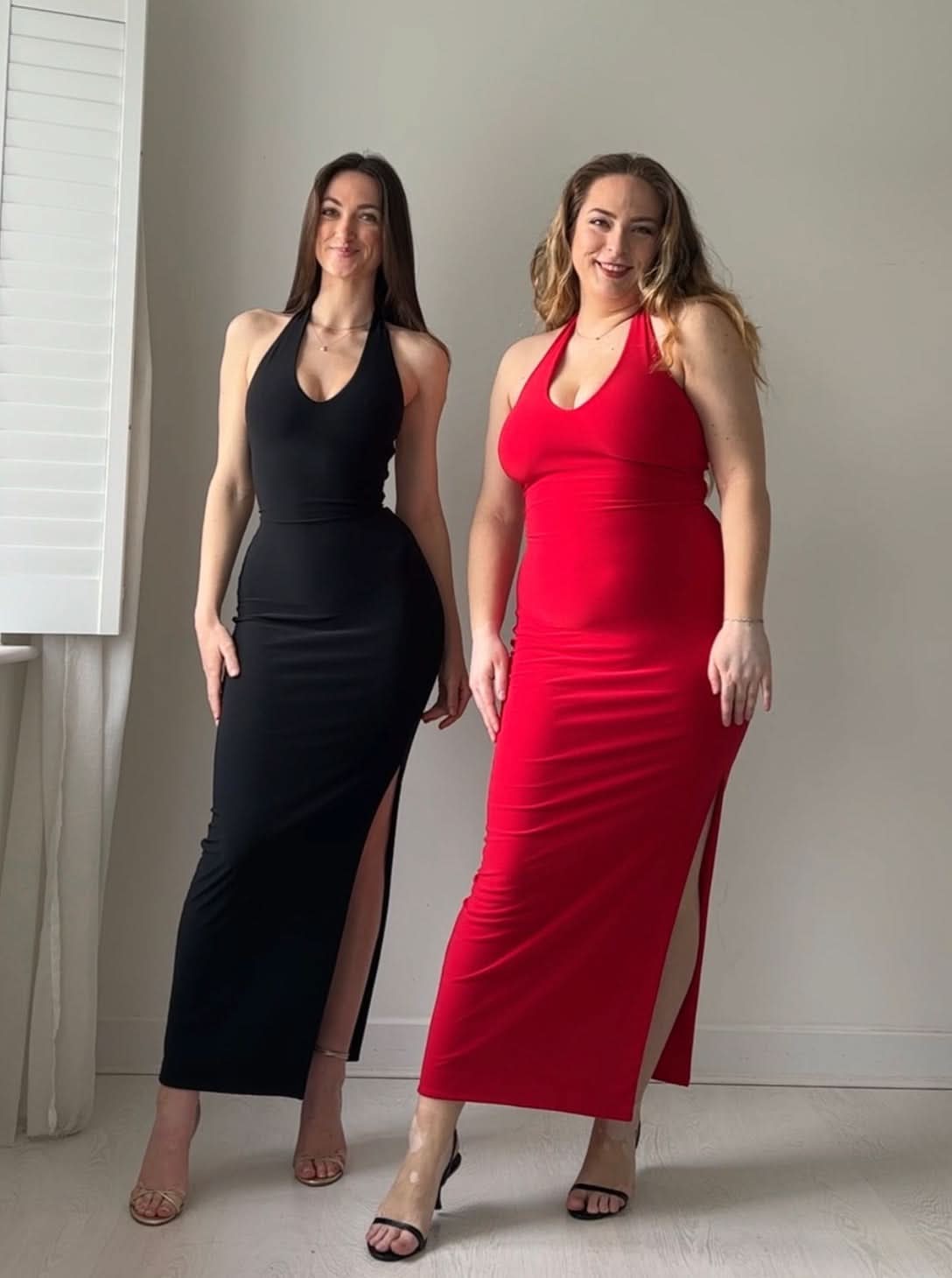Black and red halter maxi dresses side by side