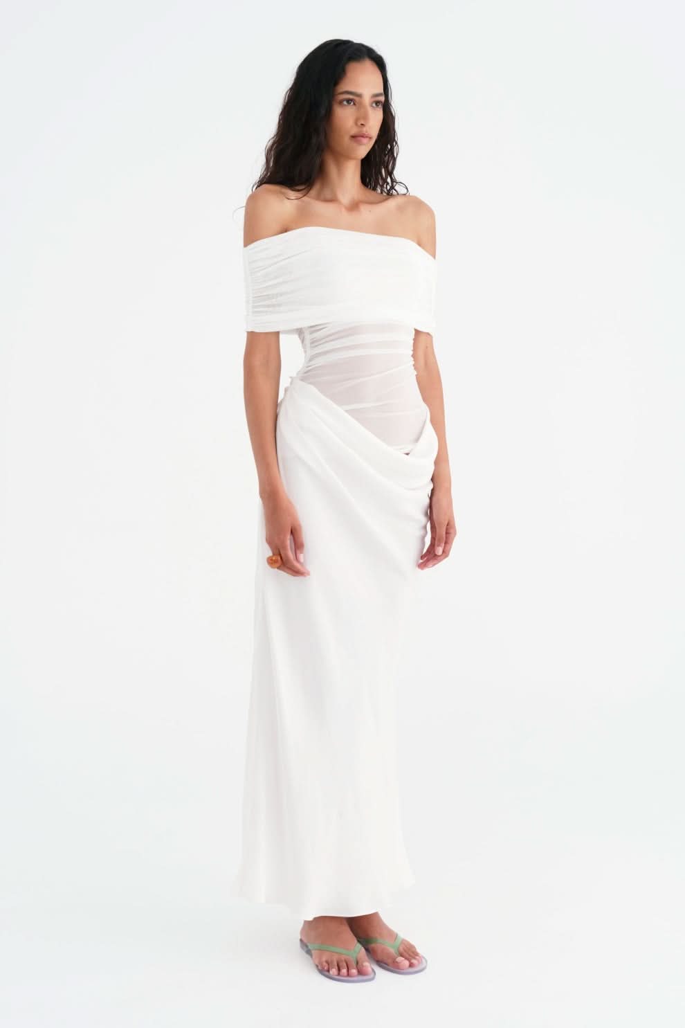 White off-shoulder maxi dress with gathered bodice and side drape detail