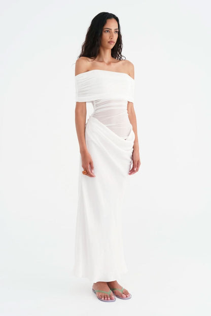 White off-shoulder maxi dress with gathered bodice and side drape detail