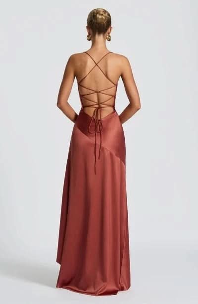 Back view of burgundy maxi dress with lace-up criss-cross straps