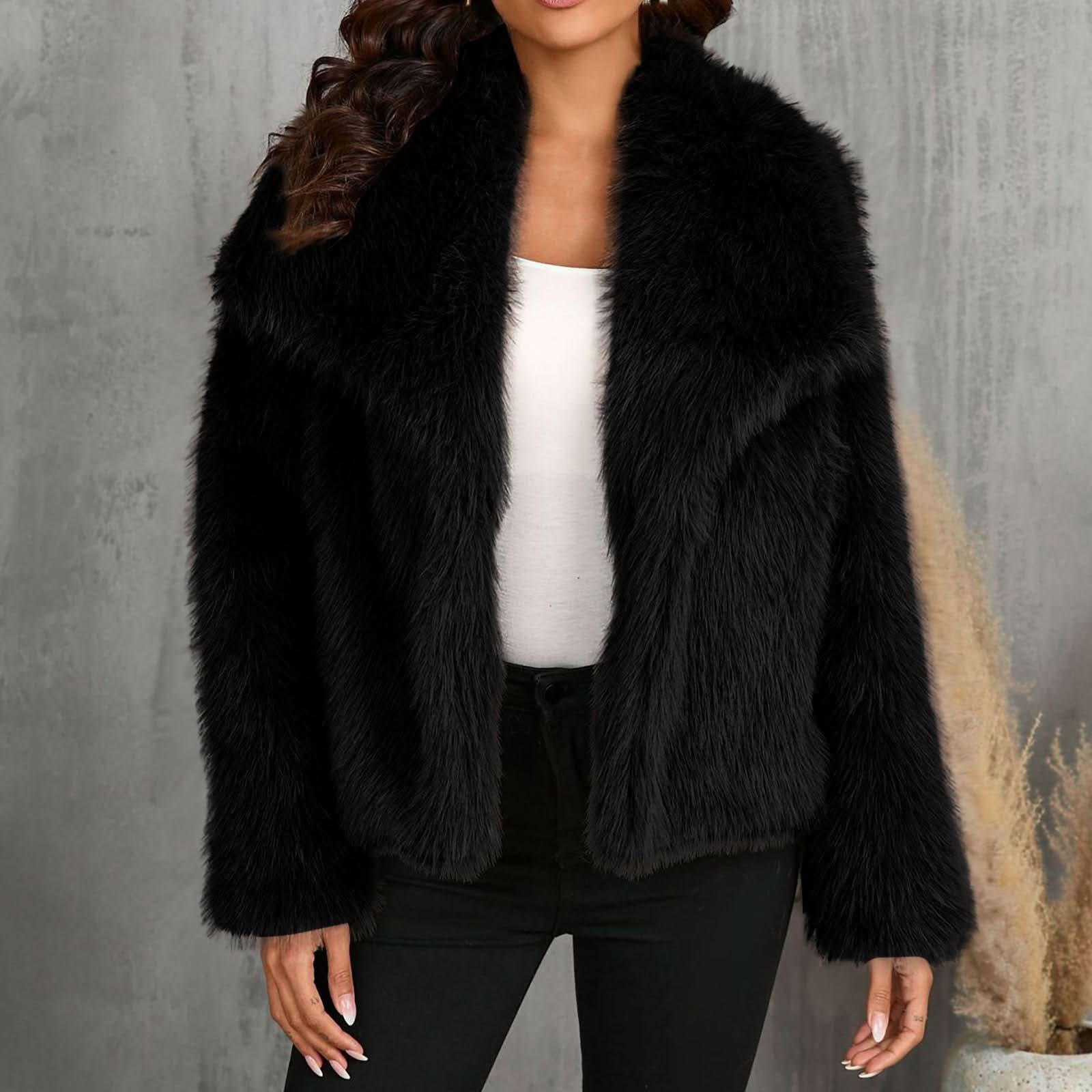 Black faux fur jacket with notch lapels and cropped length