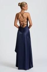 Burgundy maxi dress with cowl neckline and asymmetrical flowing skirt