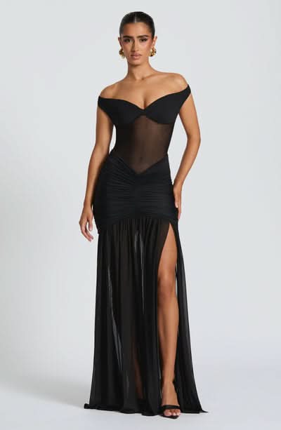 Black off-shoulder maxi dress with ruched bodice and high slit