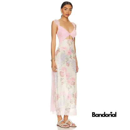 Pink lace maxi slip dress with floral print skirt and cutout waist