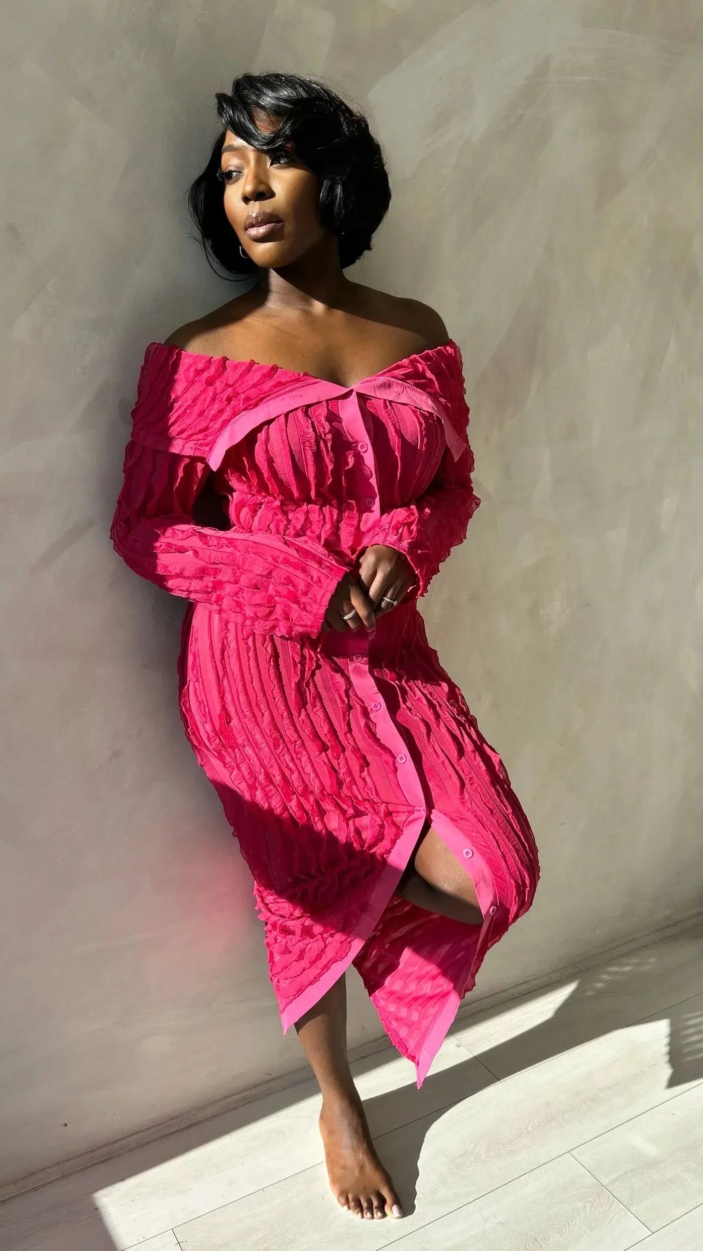 pink off-shoulder ruched midi dress with button-front closure