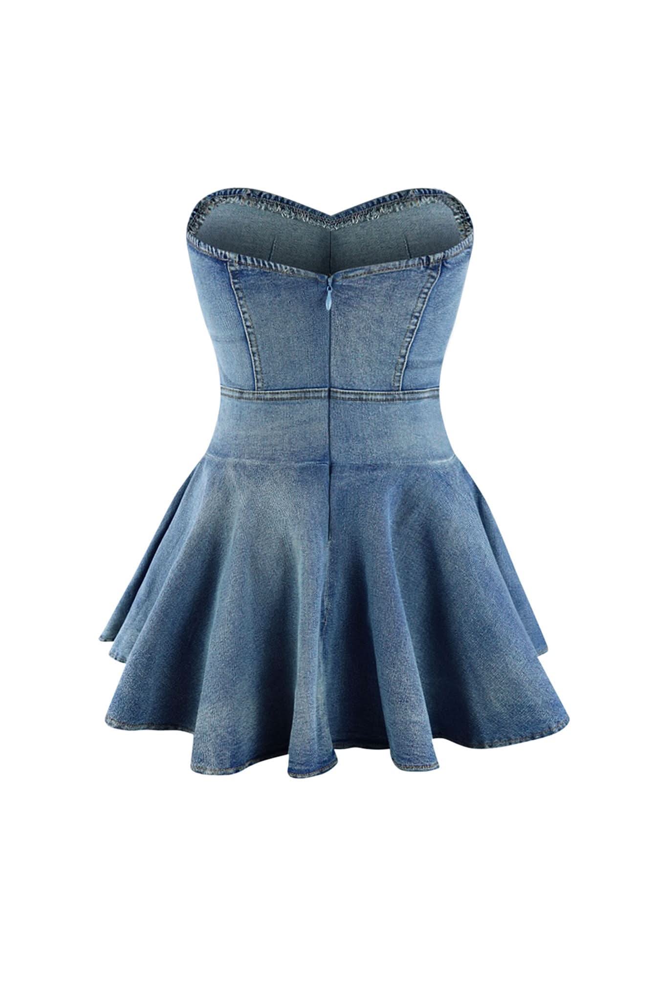 Back view of light blue denim corset dress showing center seam and flared skirt