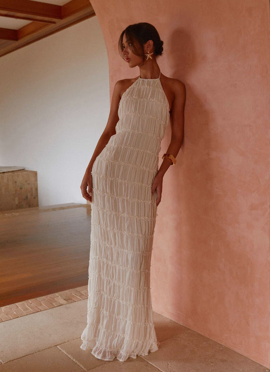 Cream pleated halter maxi dress with tiered ruffle texture