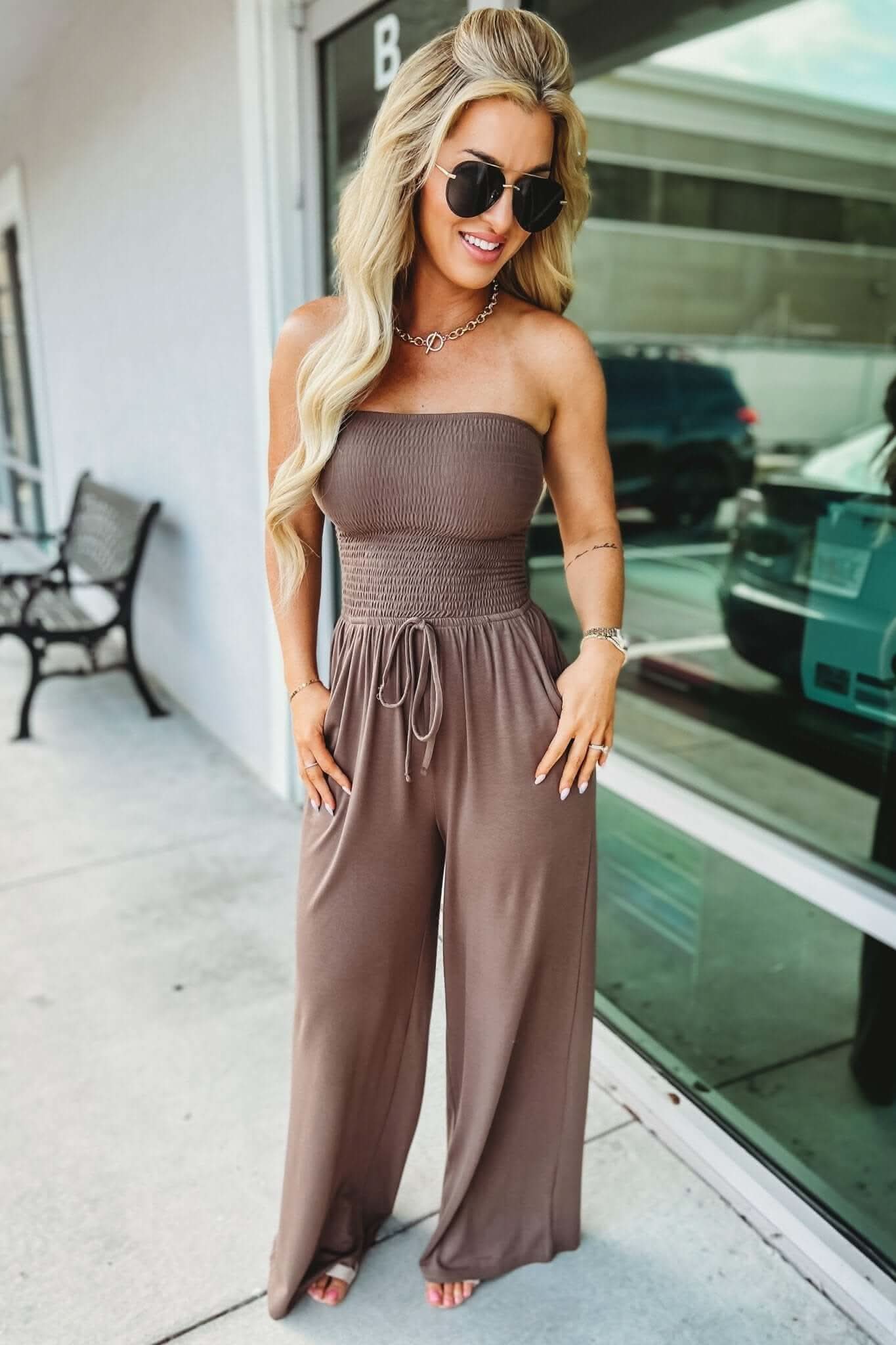 Taupe strapless jumpsuit with ribbed bodice and drawstring waist