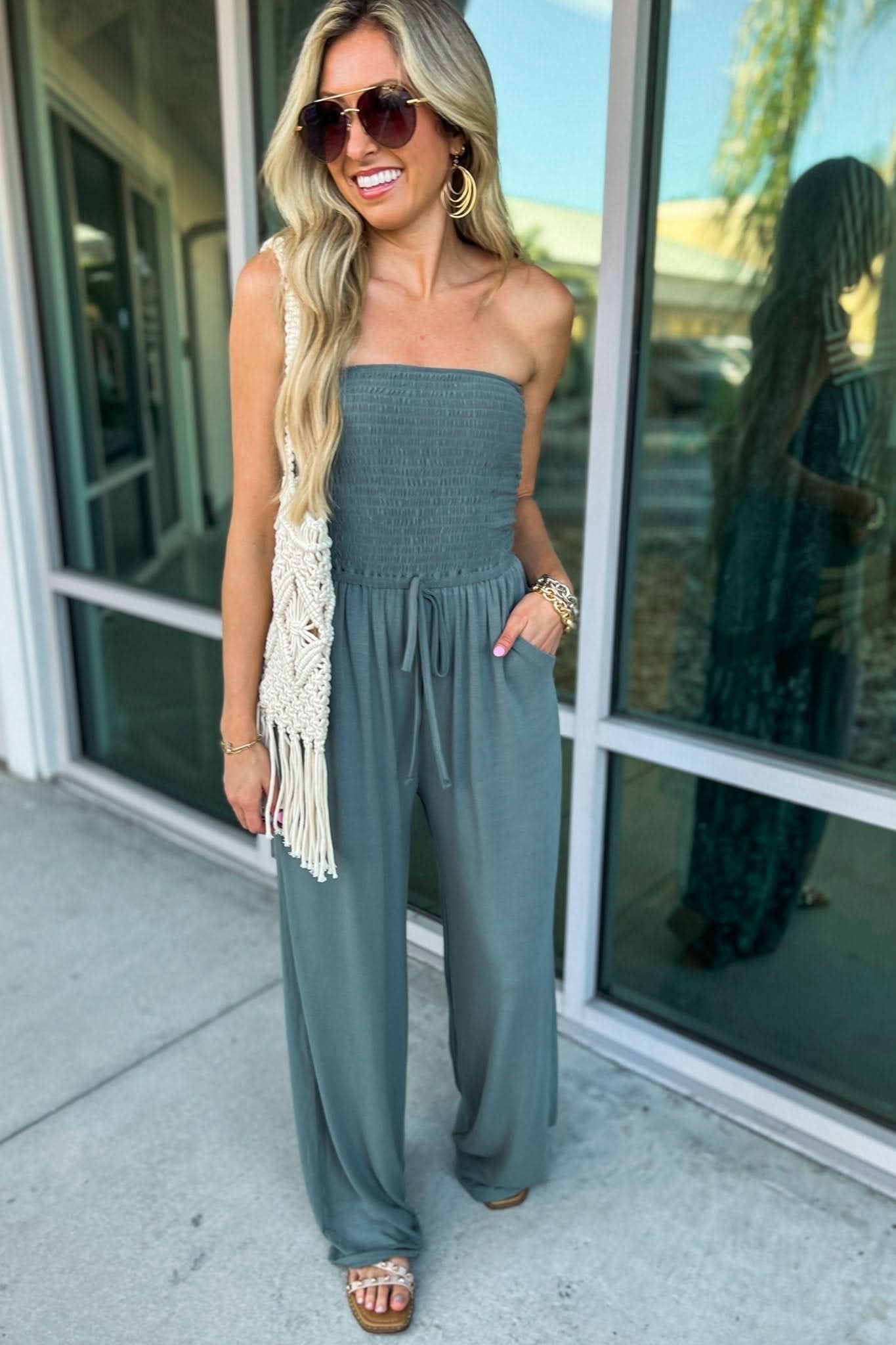 Slate gray strapless jumpsuit with textured bodice and relaxed fit