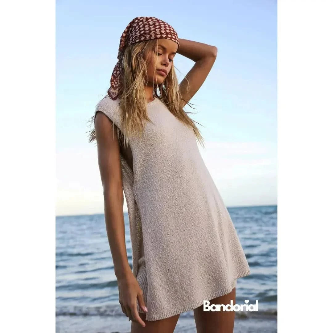 Cream knit sleeveless mini dress with patterned headwrap by ocean