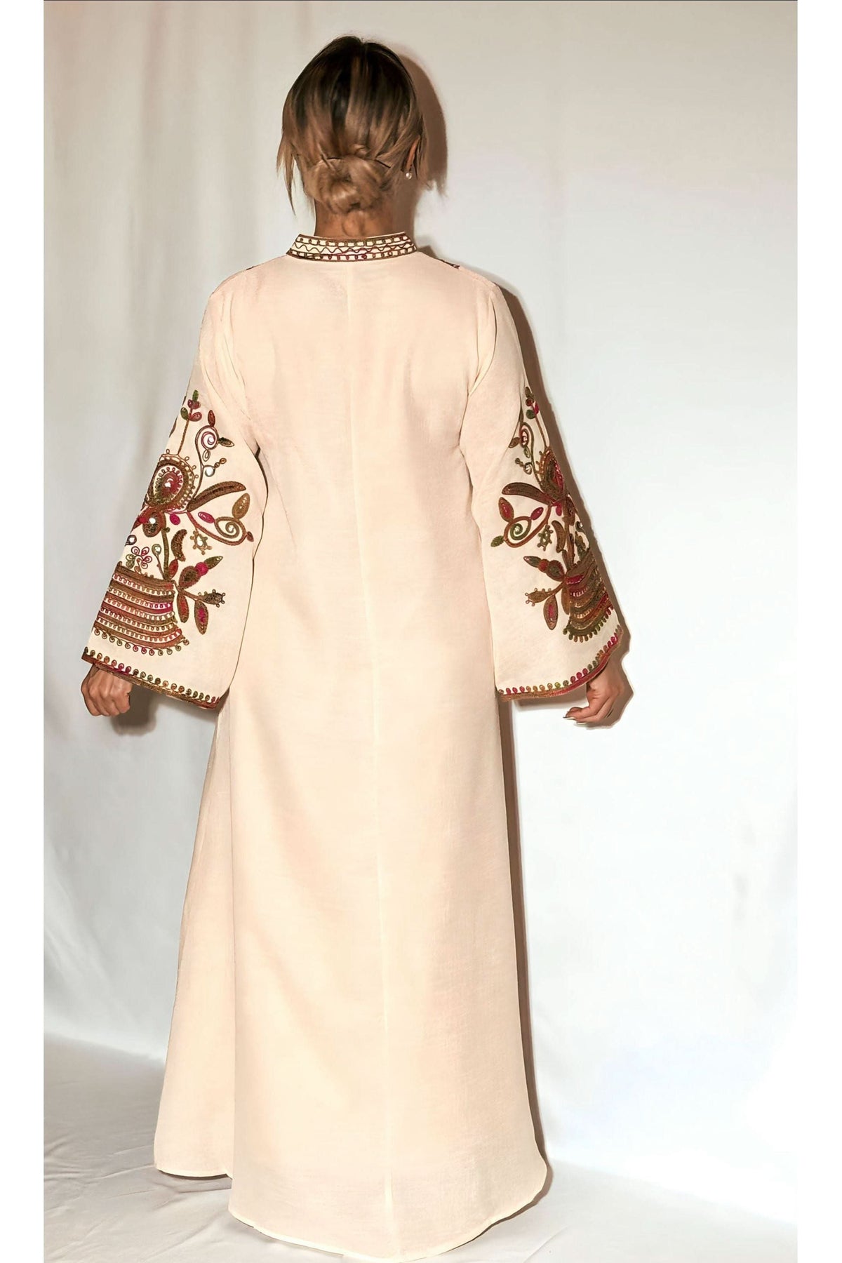 Rear view of cream maxi kaftan with patterned bell sleeves