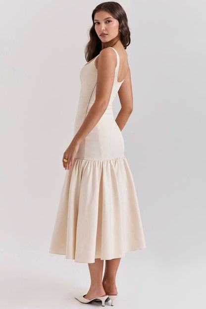 Back view of cream waist midi dress with open back detail