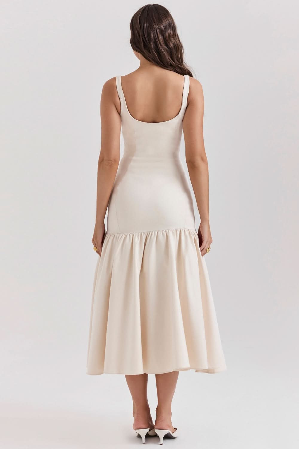 Rear view cream waist midi dress with scoop back and gathered skirt