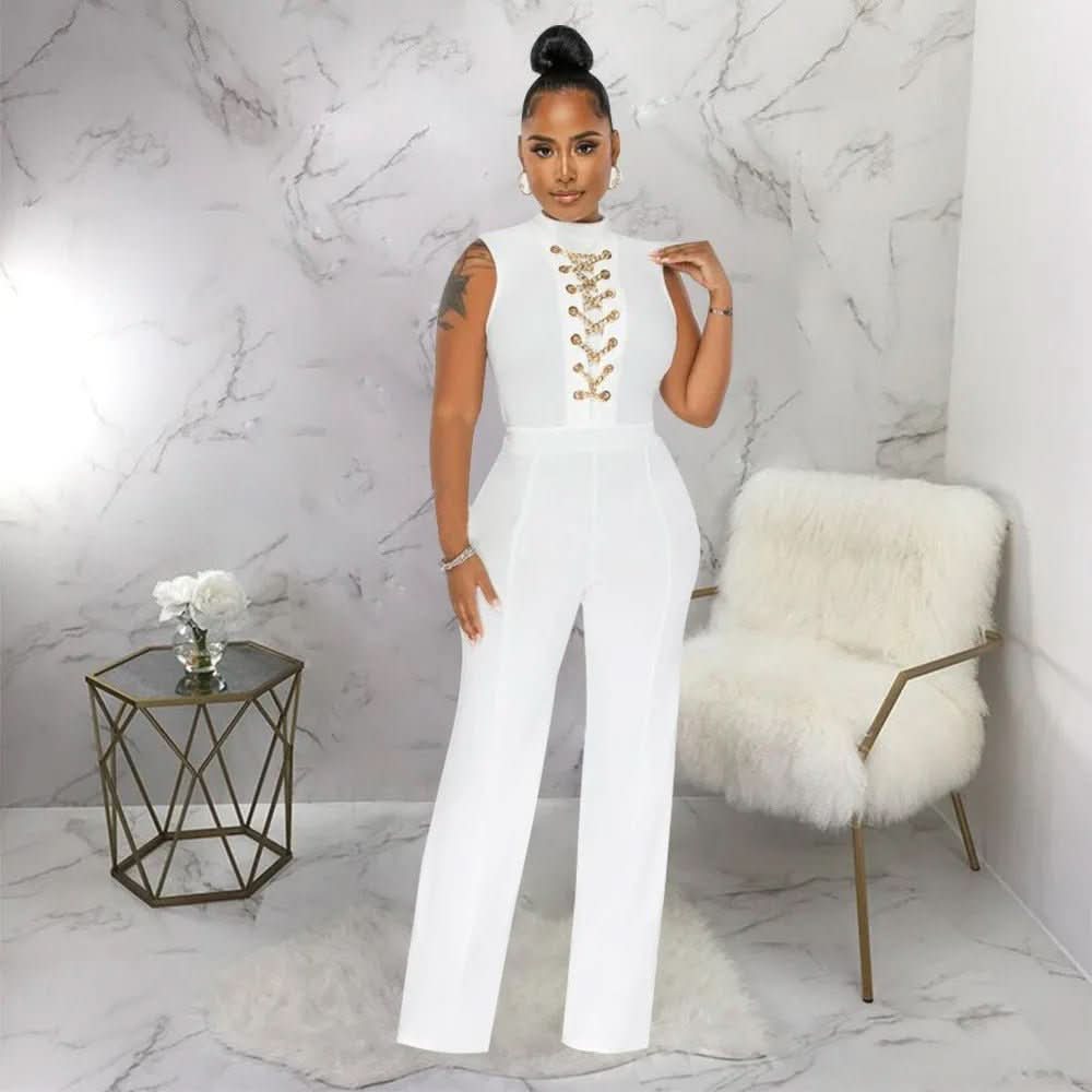 White sleeveless jumpsuit with gold chain lace-up front and cutout sides