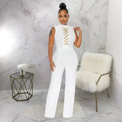White sleeveless jumpsuit with gold chain lace-up front and cutout sides