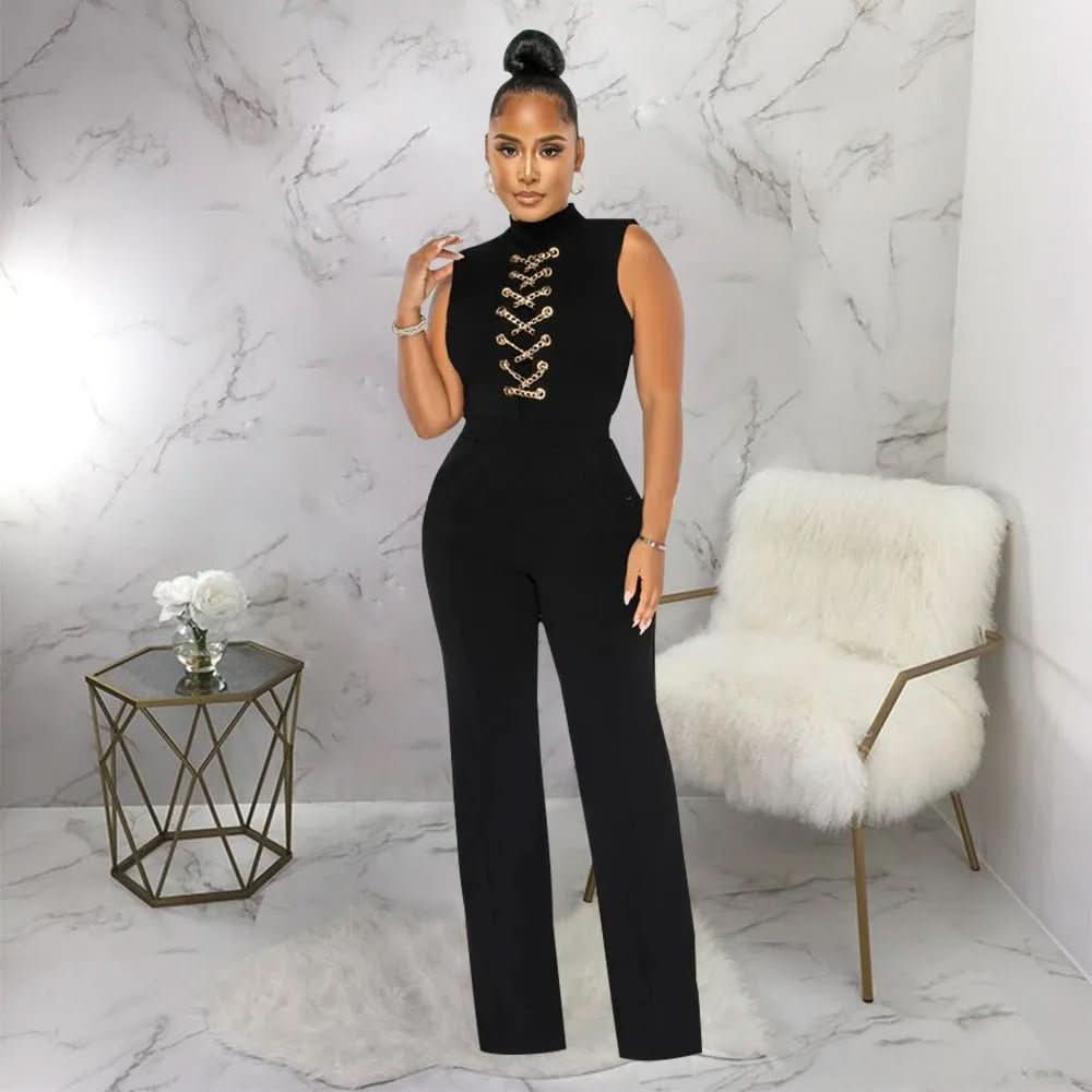Black sleeveless jumpsuit with gold chain lace-up front and wide leg fit