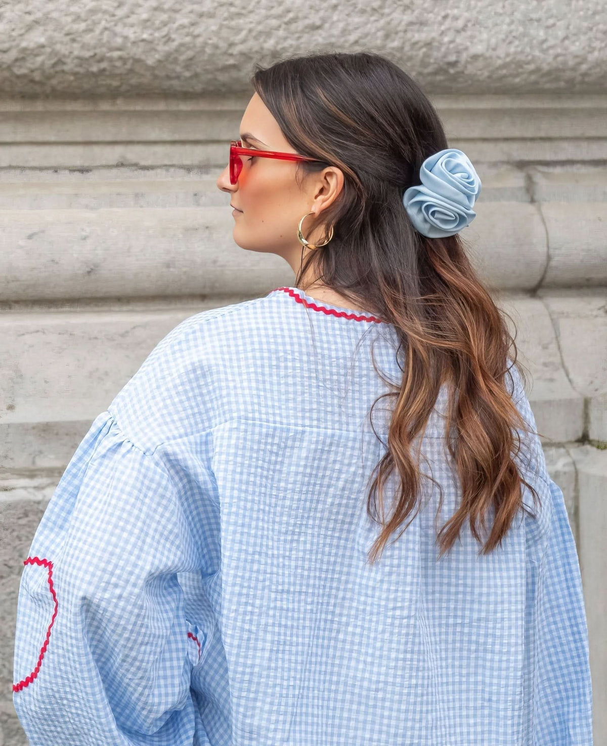 Back view of blue checkered heart top showing scalloped pocket design