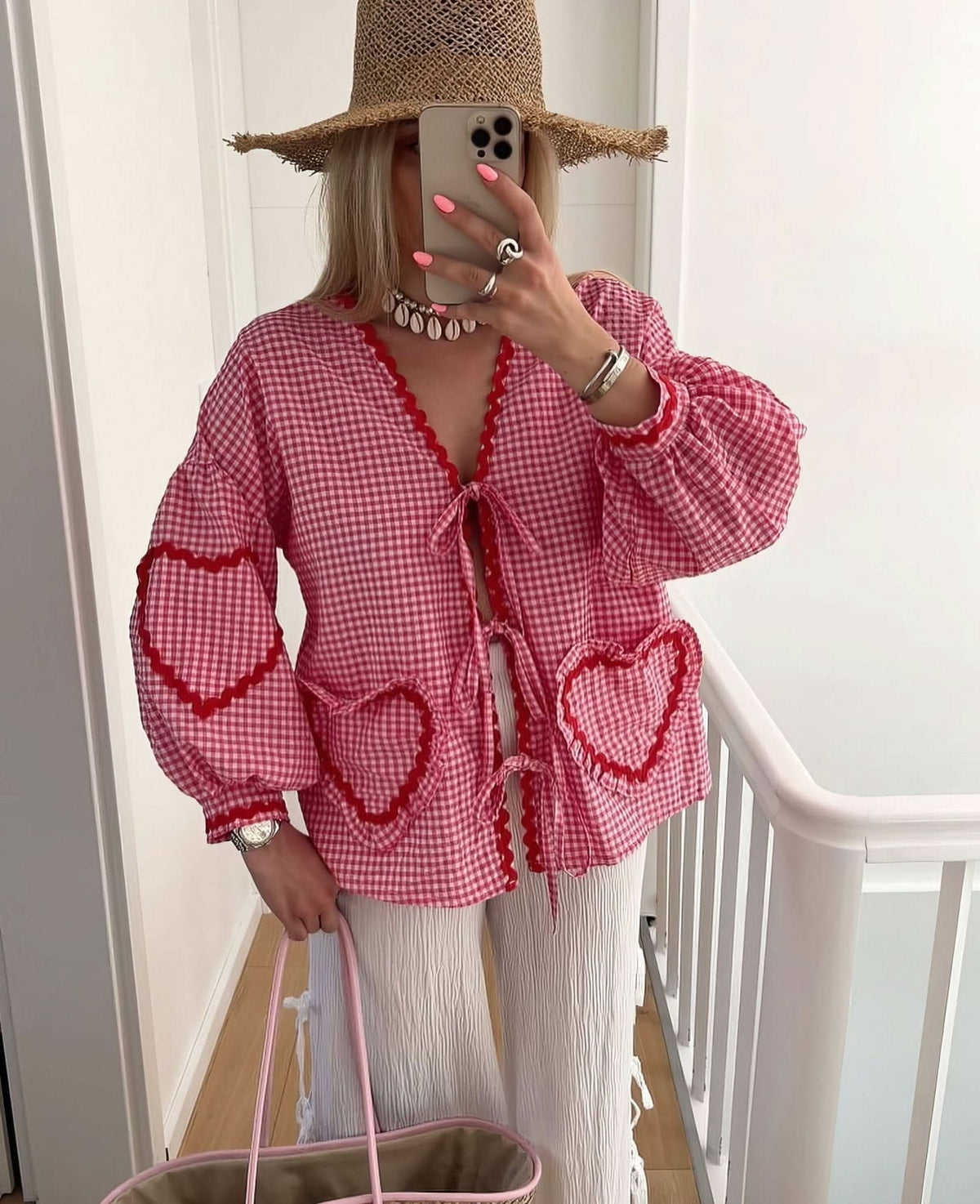 Magenta checkered heart top with puffed sleeves and scalloped pocket trim