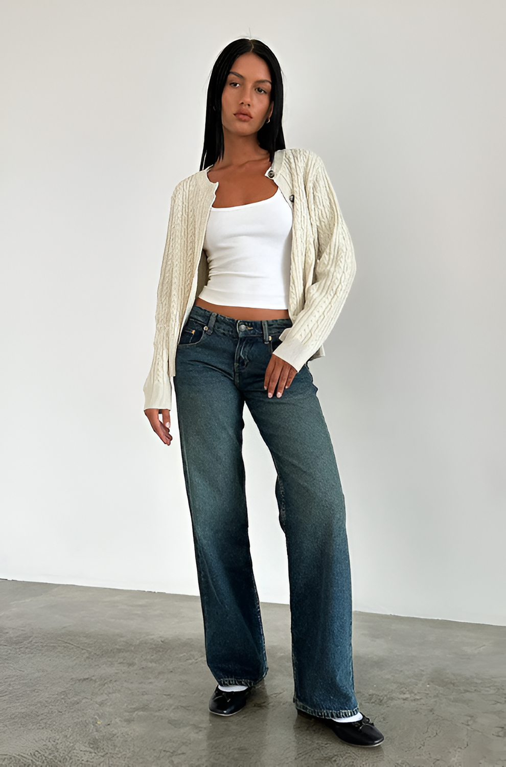 Dark teal low-rise jeans with wide leg fit and cropped hem
