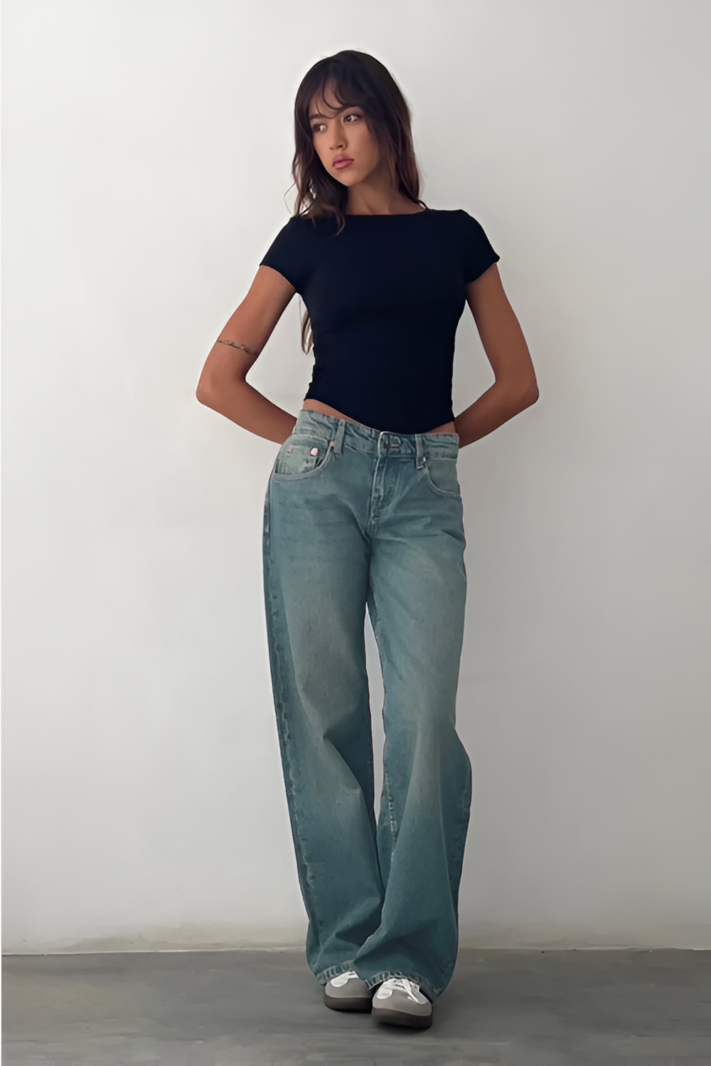 Light blue low-rise jeans with straight wide-leg silhouette