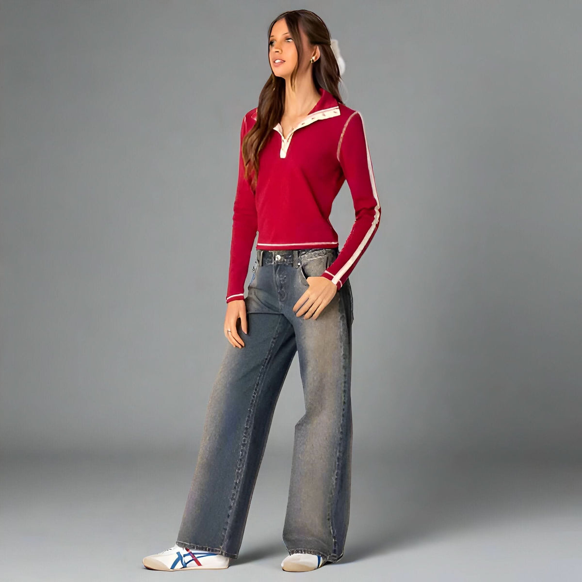 Medium wash low-rise jeans with red long-sleeve polo shirt