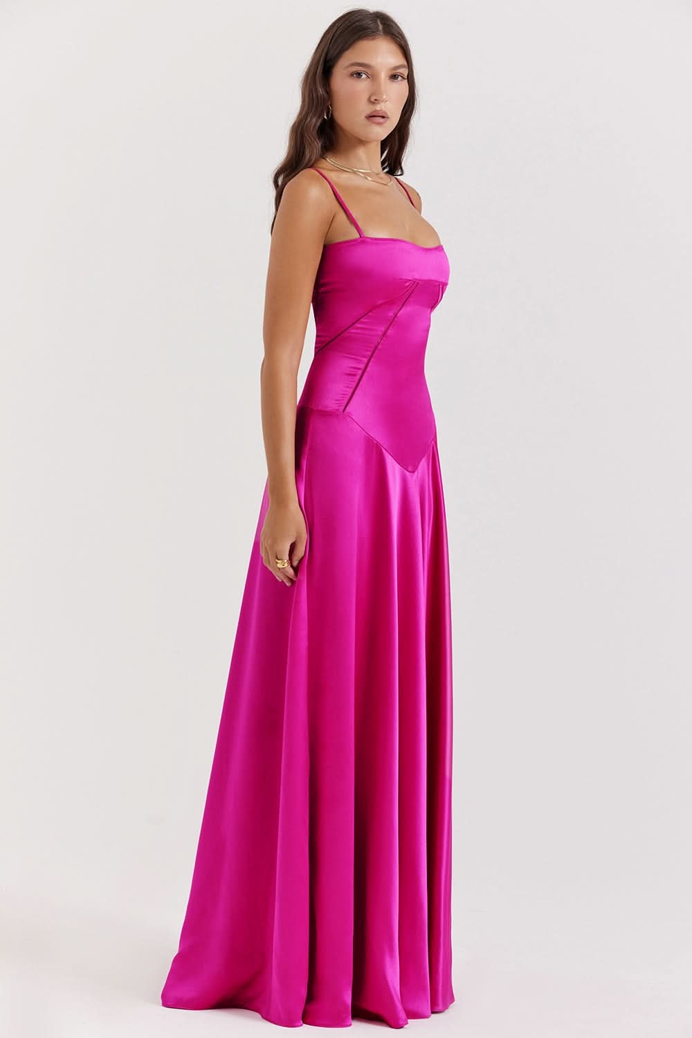 Magenta sleeveless maxi dress with structured bodice and side slit