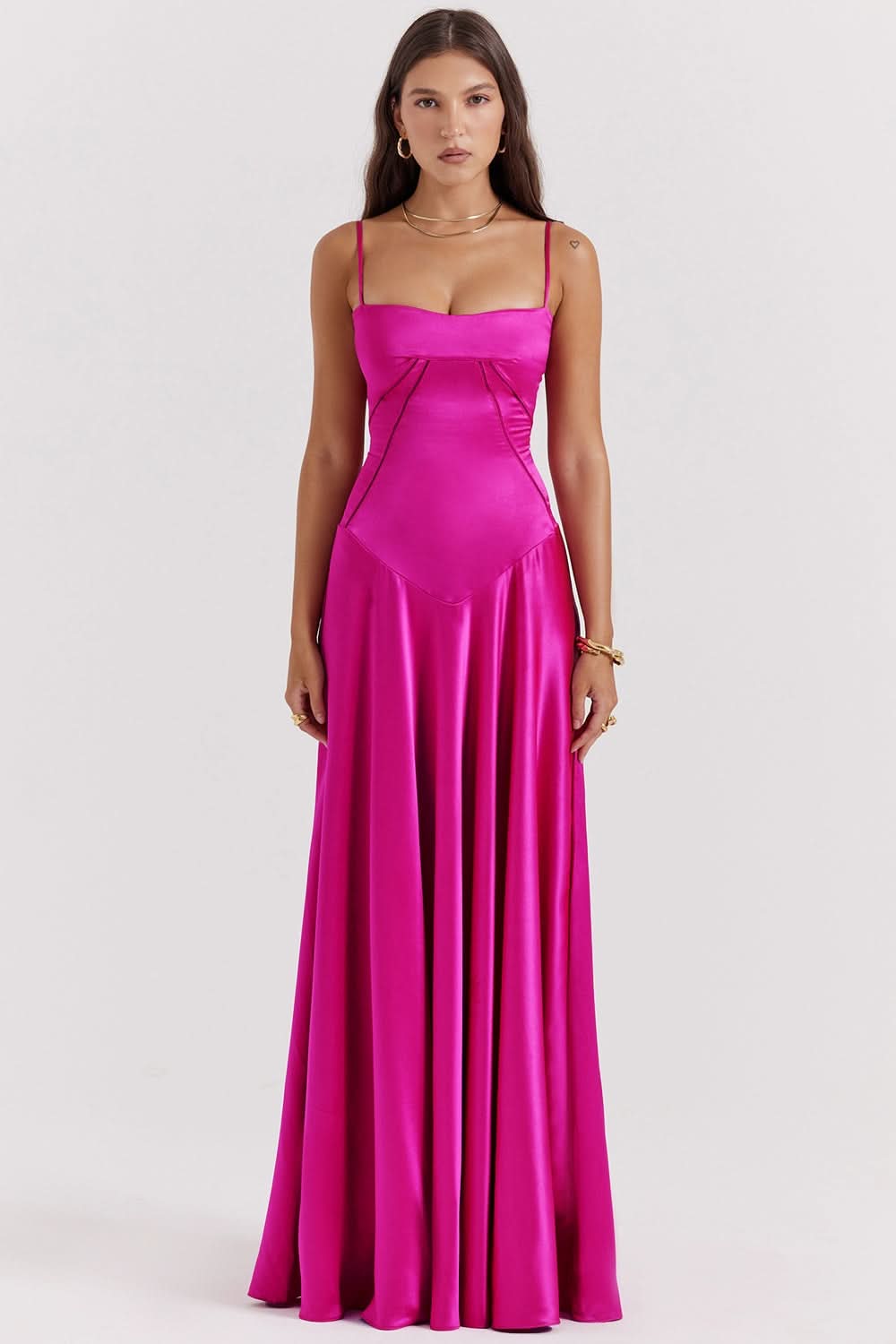 Magenta spaghetti-strap maxi dress with sweetheart neckline and flowing skirt