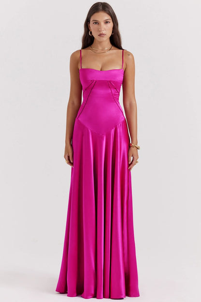 Magenta spaghetti-strap maxi dress with sweetheart neckline and flowing skirt