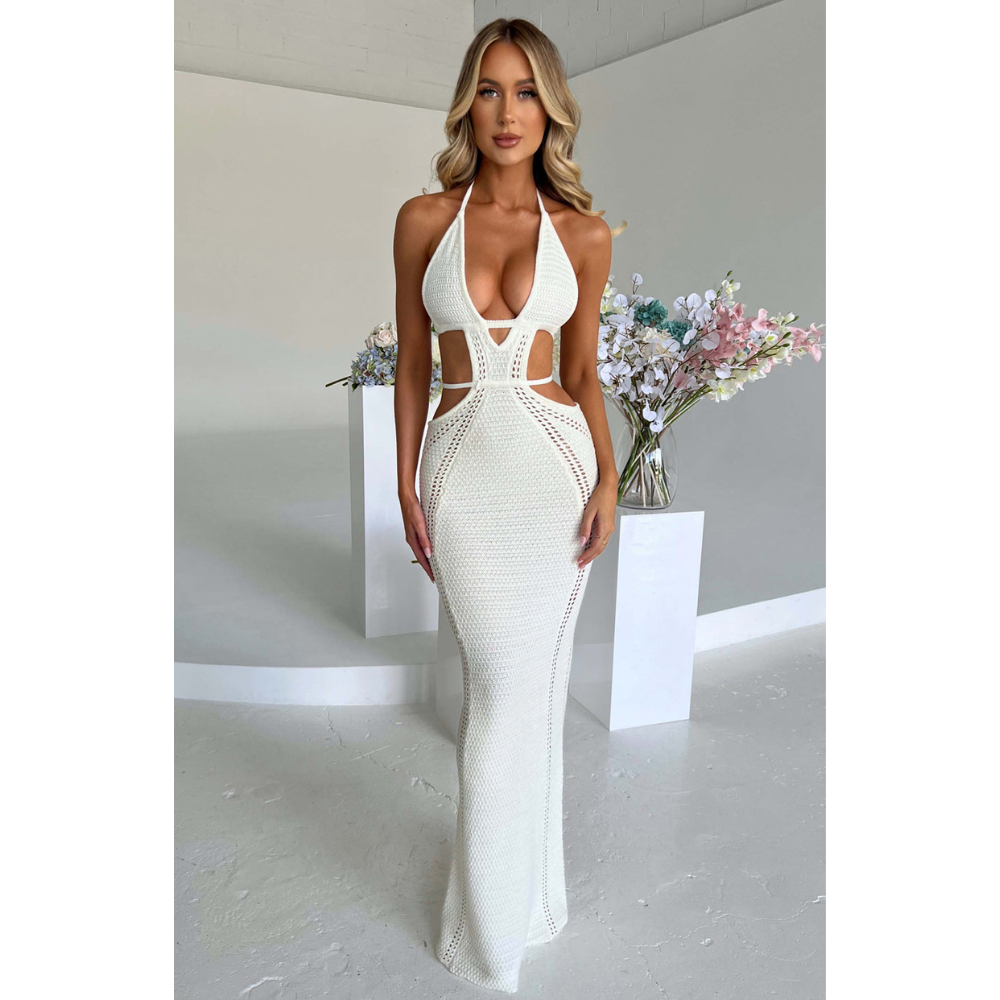 White knit maxi dress front view with deep V-neckline and waist cutouts