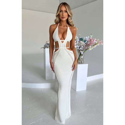 White knit maxi dress front view with deep V-neckline and waist cutouts