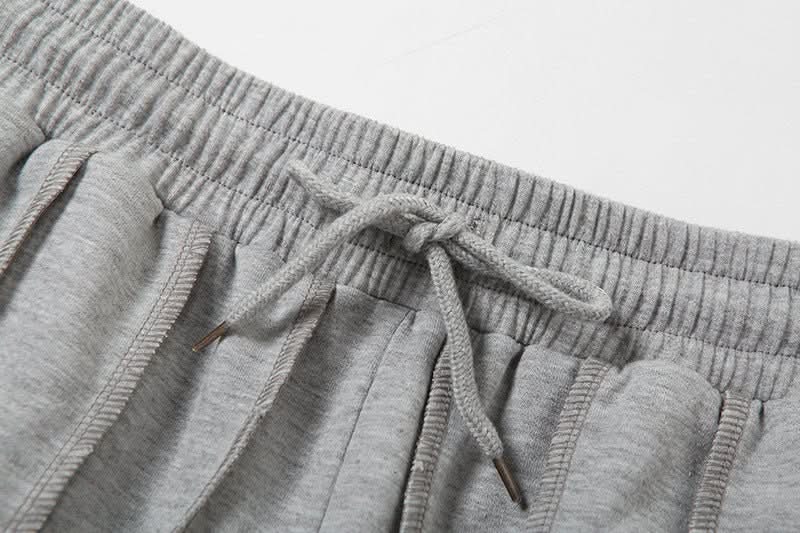 Drawstring detail on gray high waist sweatpants waistband