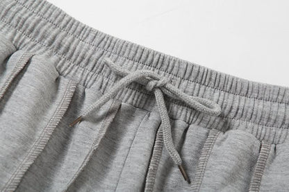 Drawstring detail on gray high waist sweatpants waistband