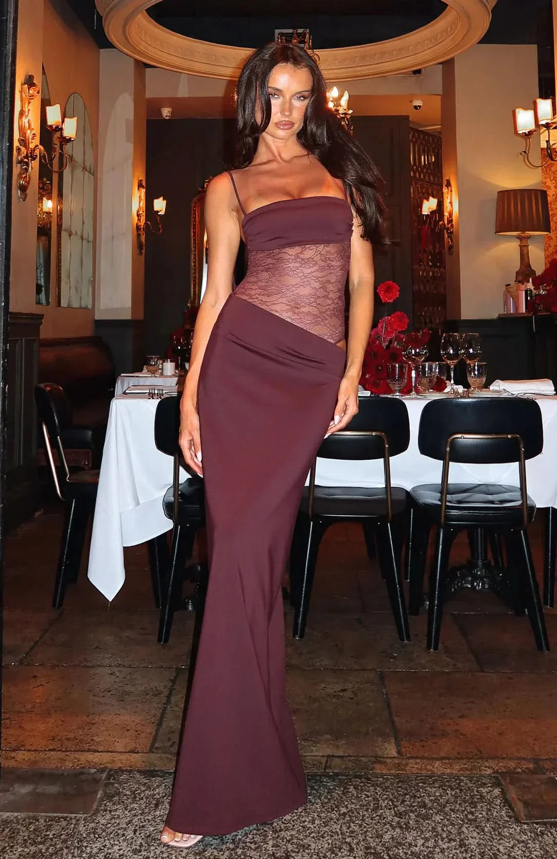 Front view burgundy evening gown with lace corset and cutout detail