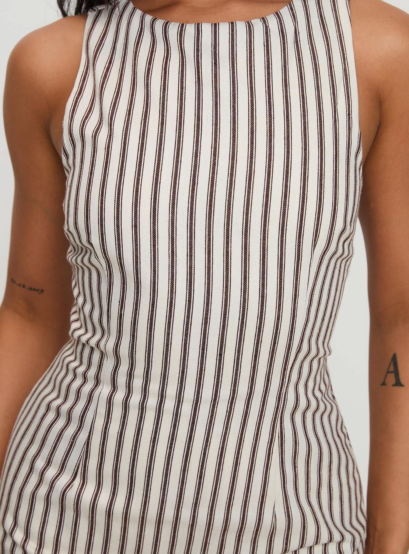 Close-up of vertical stripe pattern on sleeveless mini dress