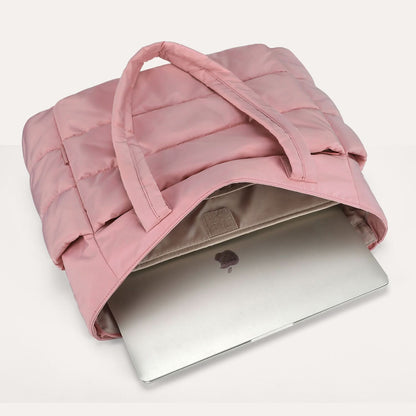 Pink puffed tote with open top showing laptop compartment and interior organization
