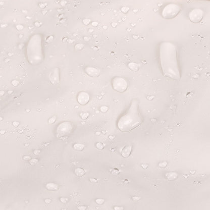 Water beading on cream tote fabric surface showing water-resistant coating
