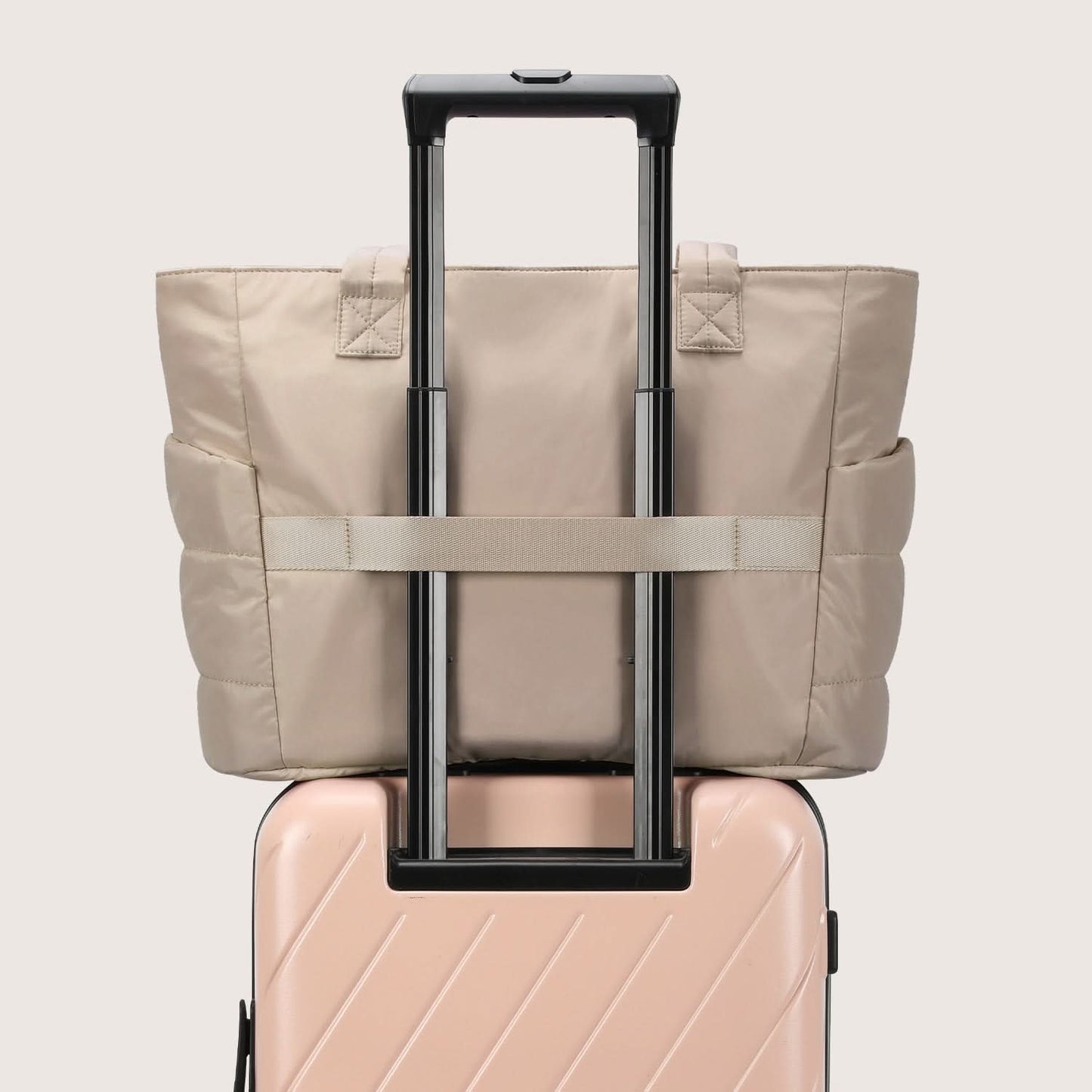 Cream quilted tote bag with water-resistant coating and soft padding