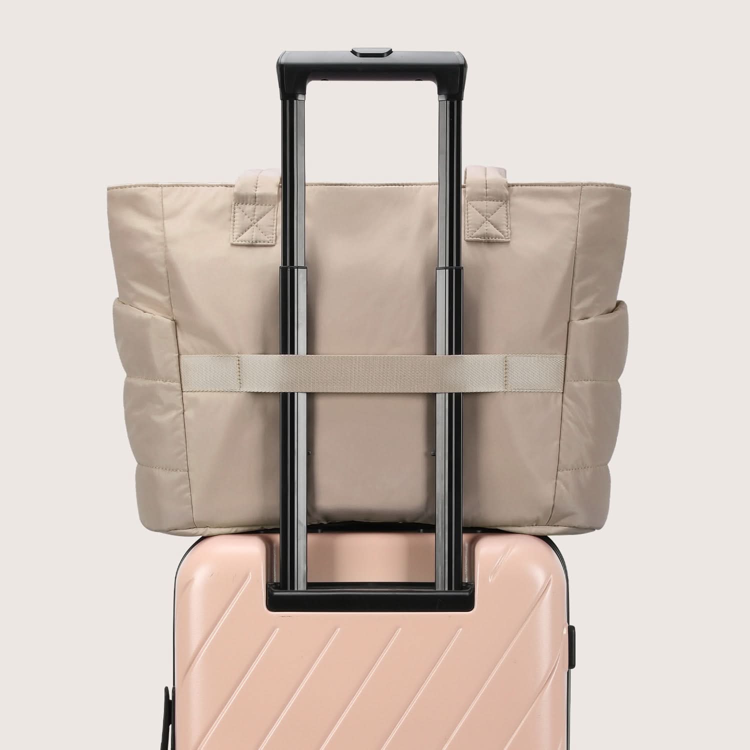 Cream quilted tote bag with water-resistant coating and soft padding