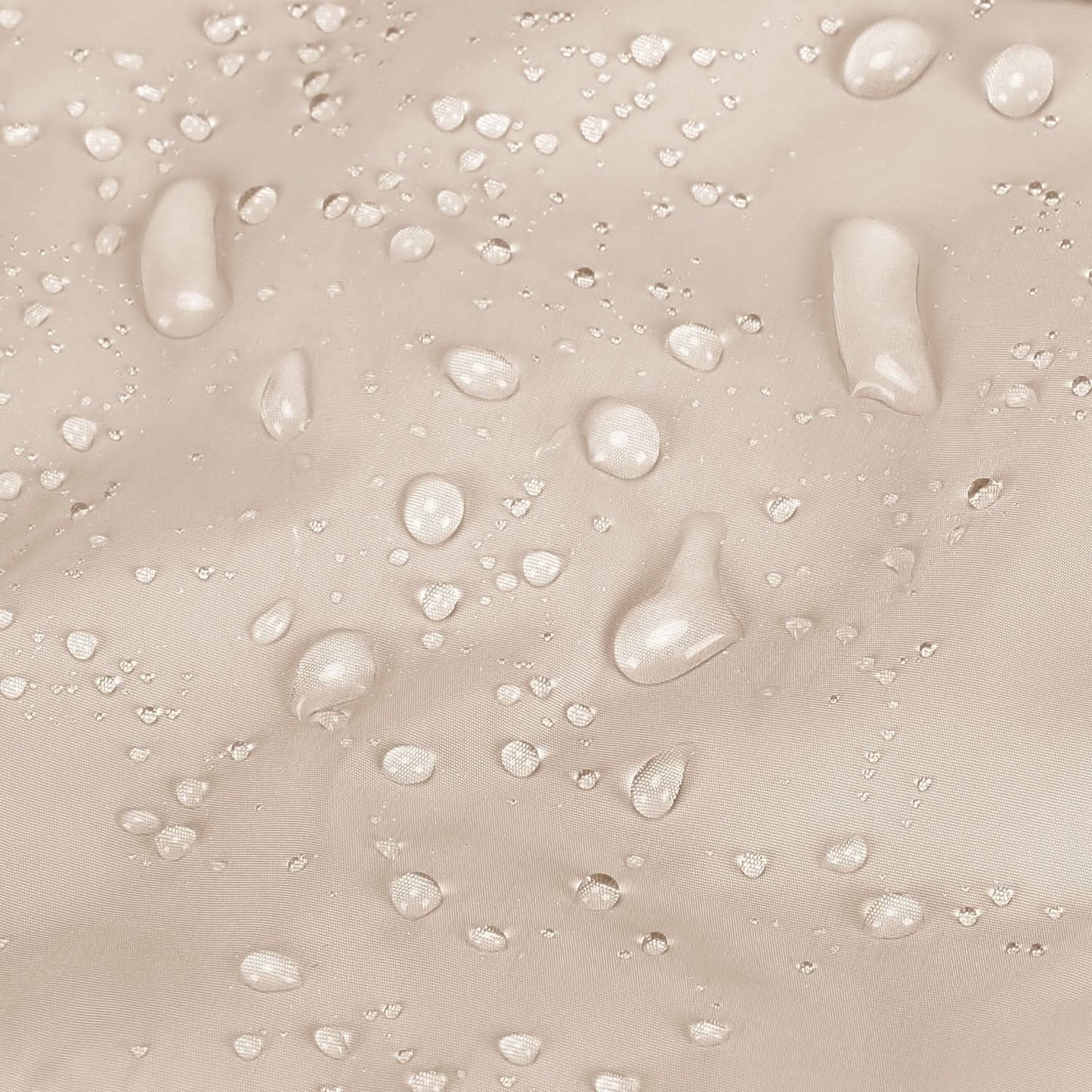 Beige water-resistant fabric with water droplets beading on surface