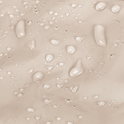 Beige water-resistant fabric with water droplets beading on surface
