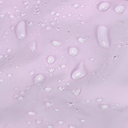Light gray water-resistant fabric with beading water droplets on surface
