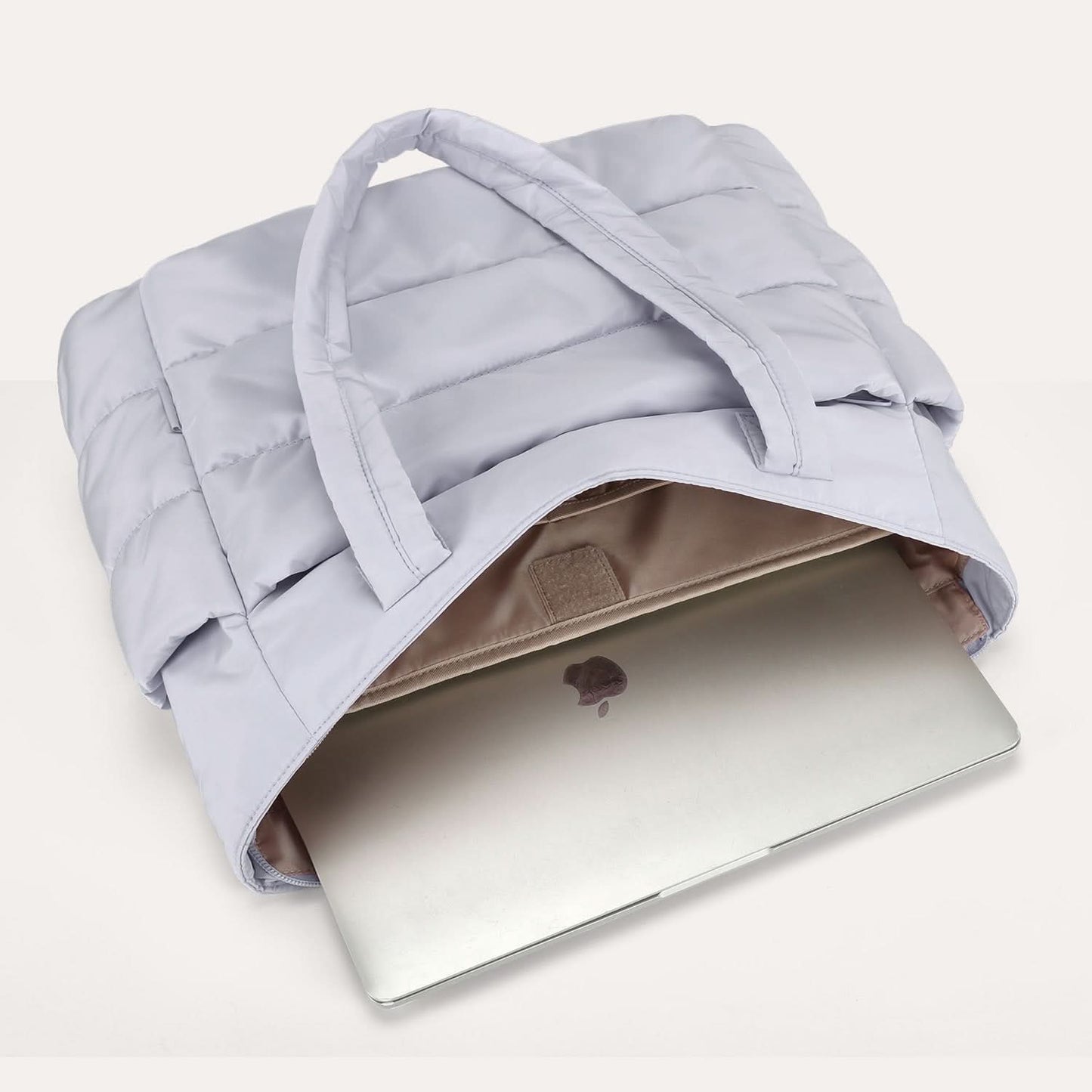 Light gray padded tote with laptop compartment and beige interior lining