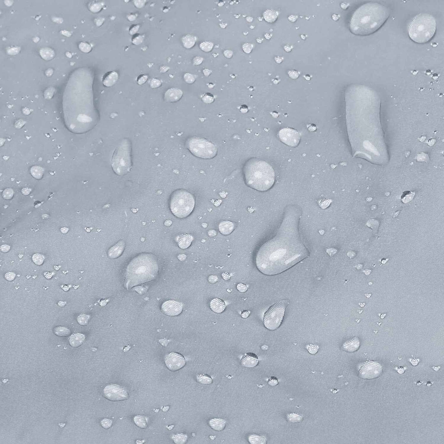 Light blue quilted fabric with water-resistant coating and droplets
