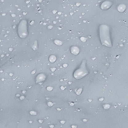 Light blue quilted fabric with water-resistant coating and droplets